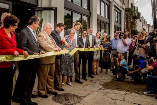 Liz Willams, Founder of SoFab, cutting the ribbon at their new home